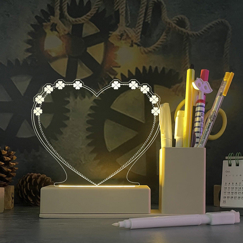 Acrylic calendar memo board with LED night light and dandelion design on desk