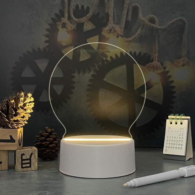 Acrylic calendar memo board with LED night light and dandelion design on desk