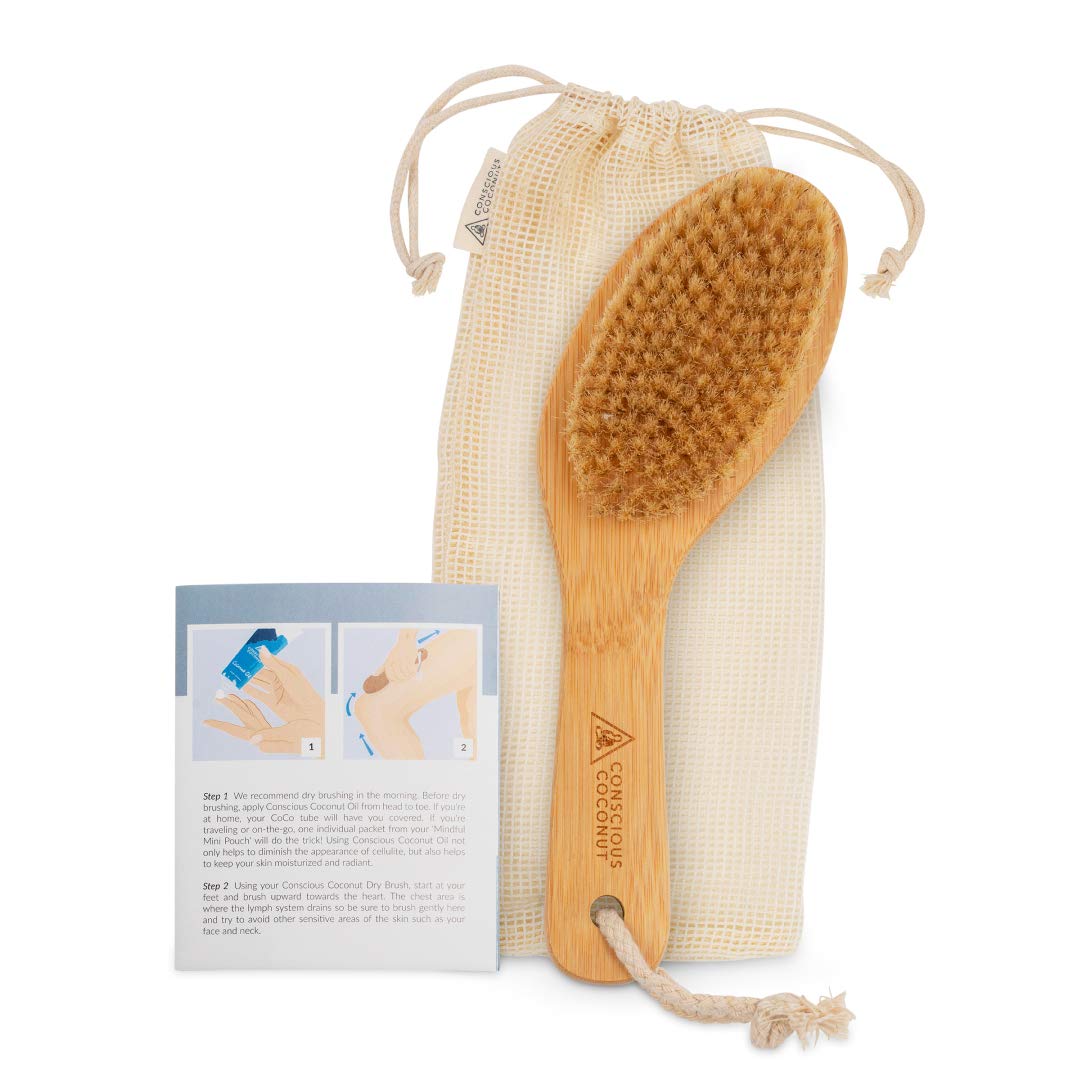 Bamboo dry brush with natural bristles and ergonomic wooden handle in travel bag for gentle skin exfoliation