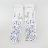 White cotton Massage Socks with blue printed acupressure reflexology diagrams and split-toe design for foot therapy.