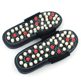 Acupressure foot massage slippers with raised nodes and adjustable straps for relaxing tired feet at home