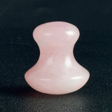 Natural Jade Mushroom Gua Sha massage tool in pink agate for skin rejuvenation and detoxification