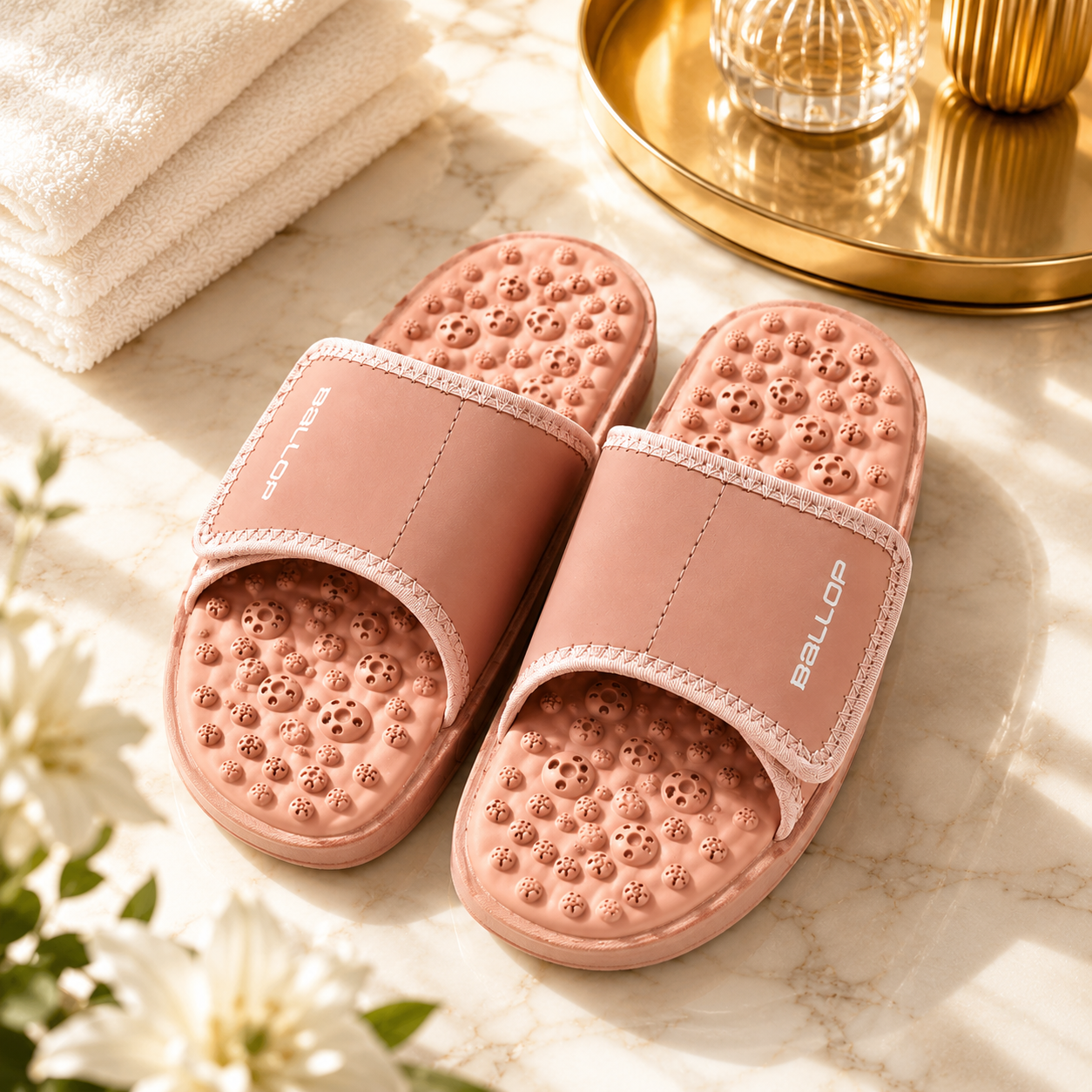 Pair of acupressure slippers with patented footbed and built-in arch support for foot tension relief and circulation boost