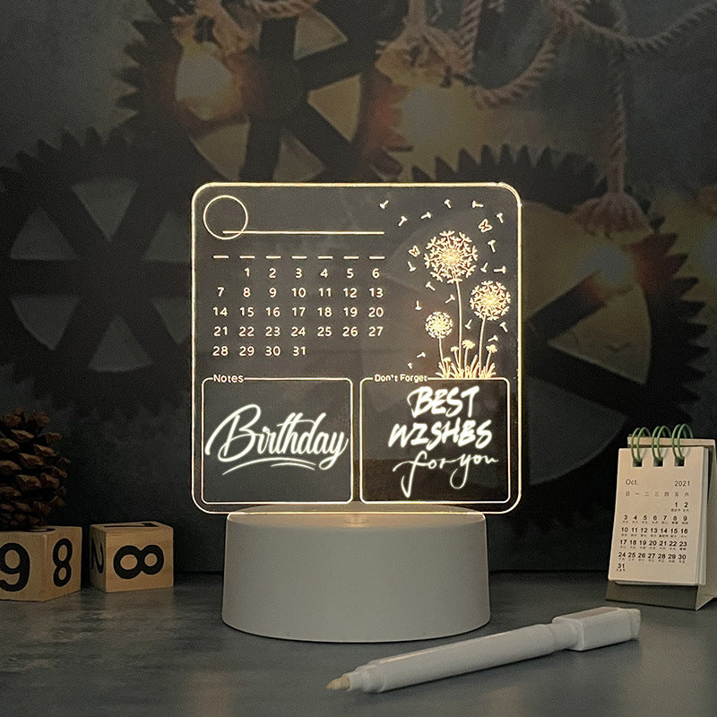 Acrylic calendar memo board with LED night light and dandelion design on desk