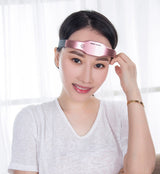 Wireless head massager helmet for stress relief and sleep therapy in black and pink colors