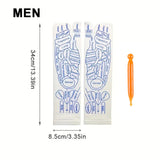 Men's white cotton massage socks with blue reflexology diagrams and an orange massage stick for acupressure therapy.