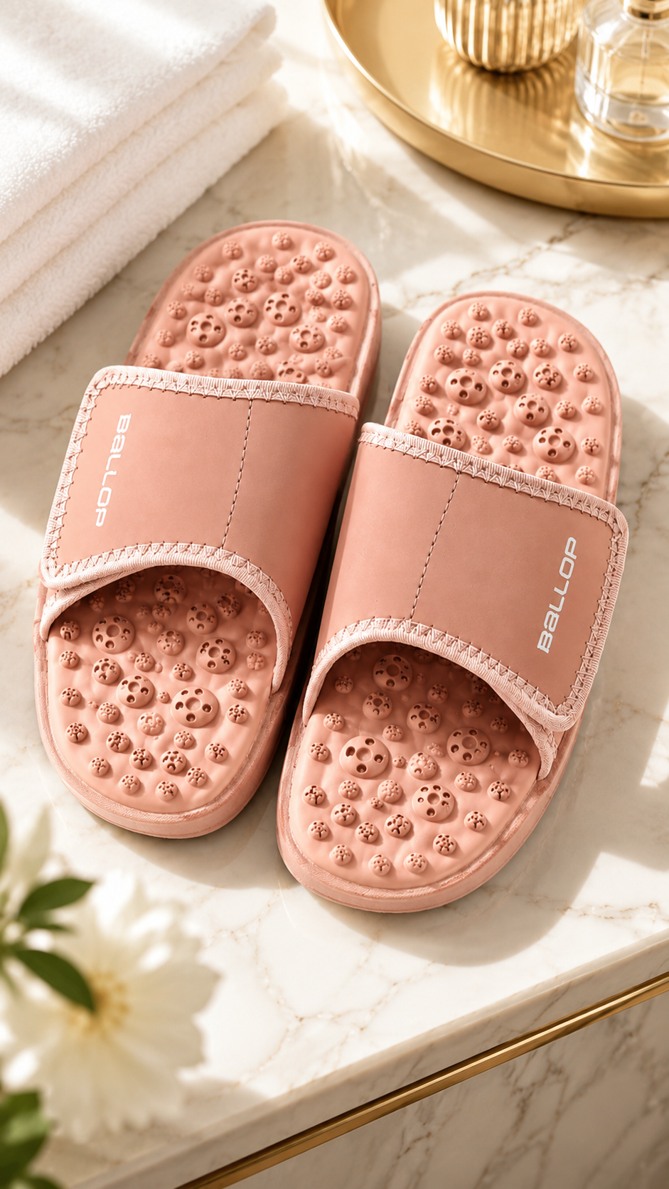 Pair of acupressure slippers with patented footbed and adjustable strap for foot tension relief and arch support