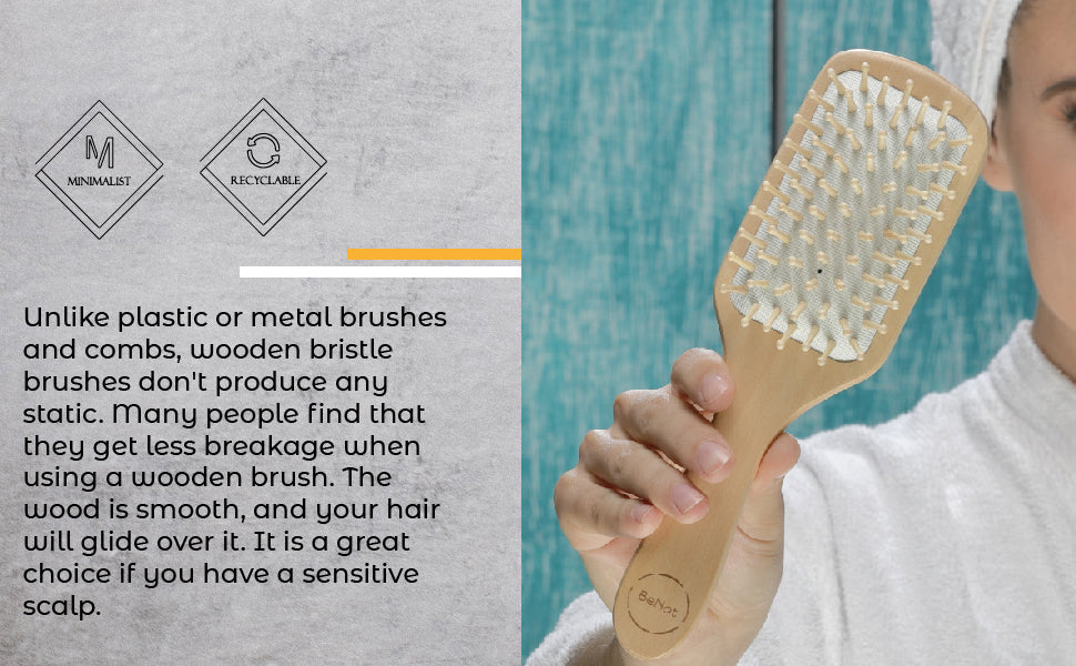 Natural wooden detangling hair brush with bamboo bristles and rubber cushioning for gentle, static-free grooming