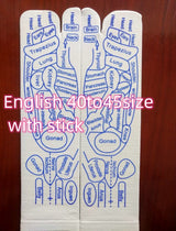 Cotton reflexology Massage Socks in white with blue acupressure point diagrams for feet and toes and an included massage stick.